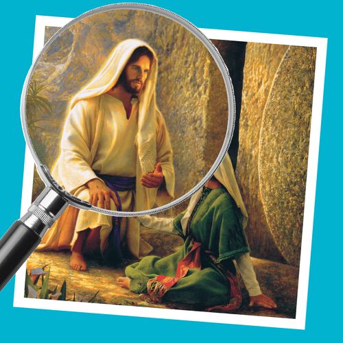 magnifying glass over an image of Jesus Christ