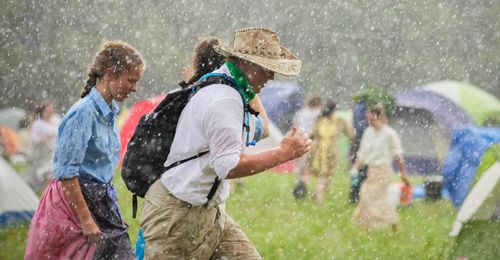 youth running through rain