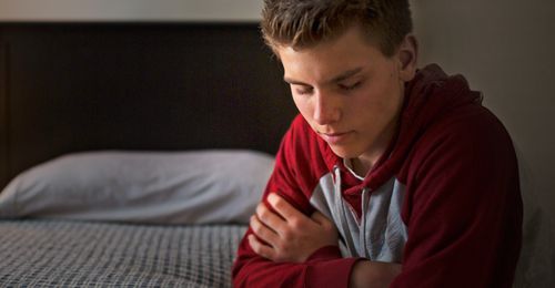 young man praying