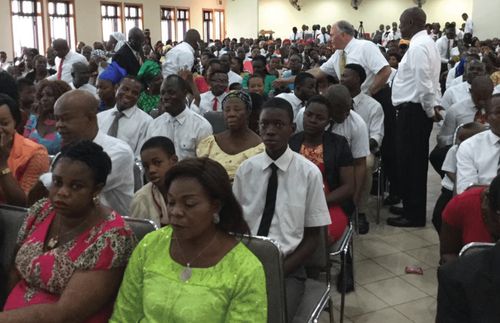 Elder Rasband shaking hands in Takoradi, Ghana