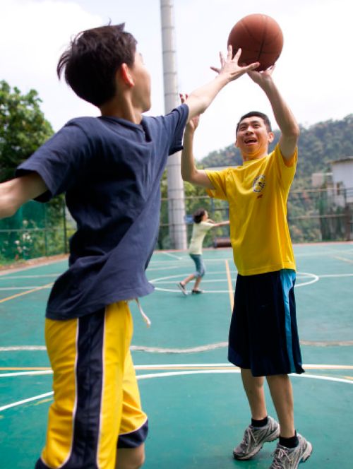 boys playing basketball