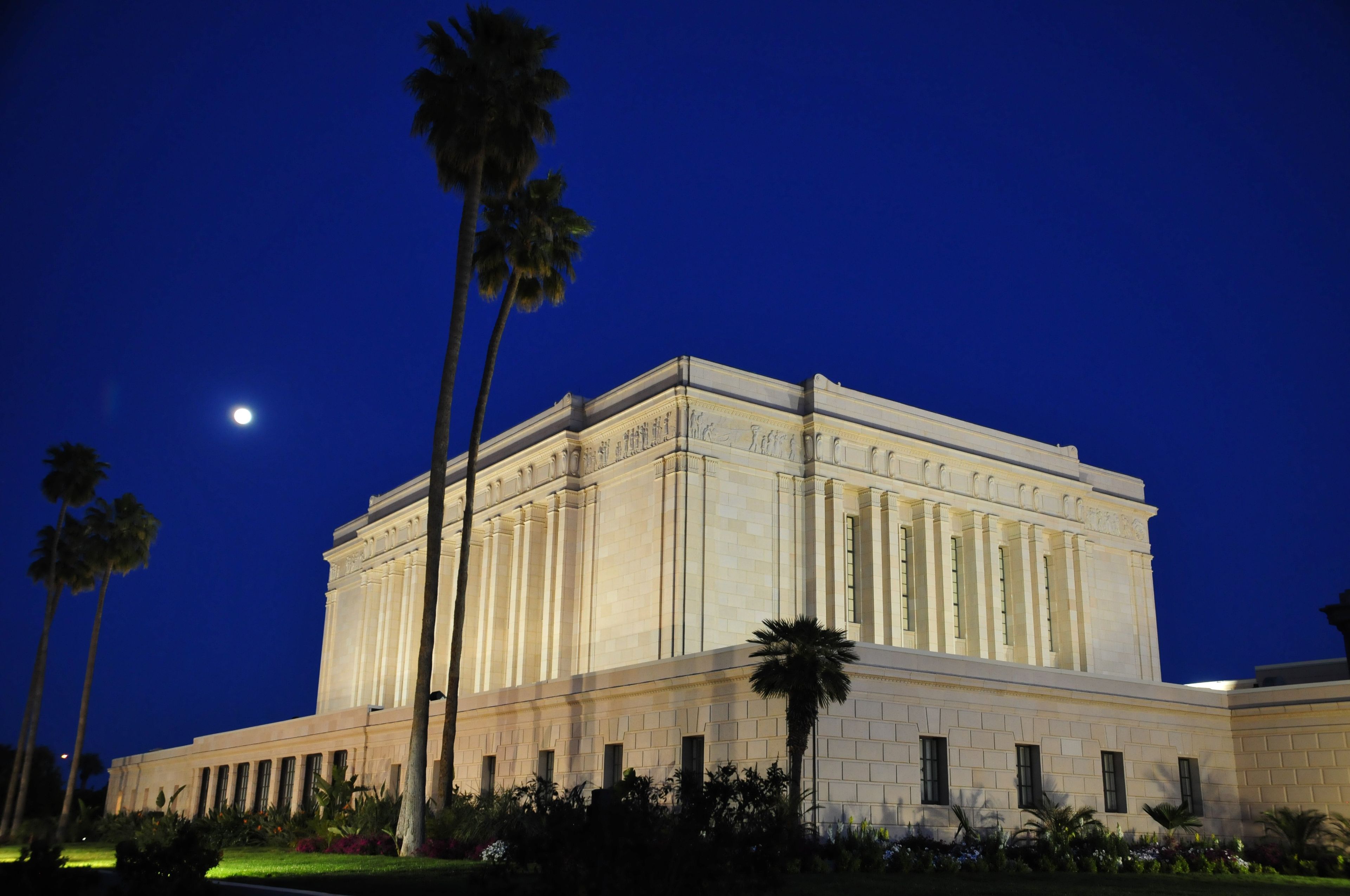 The Mesa Arizona Temple in the evening, including scenery.