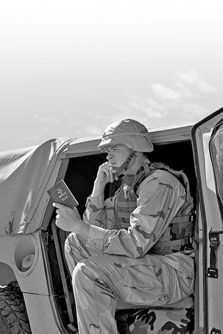 Soldier reading Book of Mormon