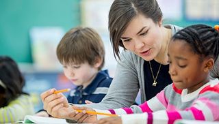 Teacher with students