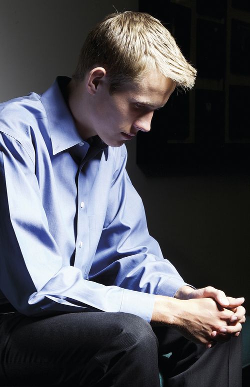 A young man waiting to talk to his Bishop.