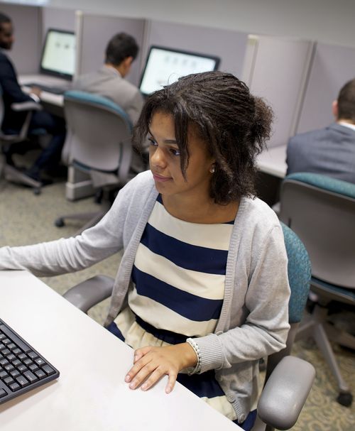 young woman at computer