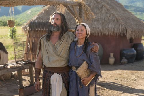 Nephi with his arm around his wife