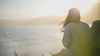 woman looking at ocean