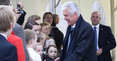 President Dieter F. Uchtdorf greeting members at temple dedication