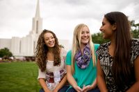 young women in front of temple