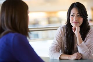 two women having a conversation