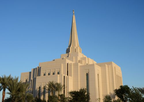 A daytime view of the Gilbert Arizona Temple, with a clear blue sky in the background.
