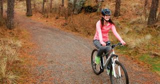 young woman enjoying a bike ride