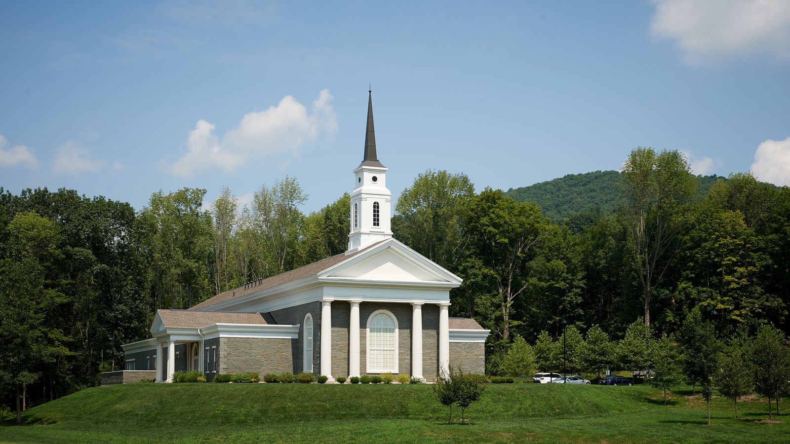 Exterior shots of a church building. There is a sign outside that says it is the Priesthood restoration Site. This is in Pennsylvania.