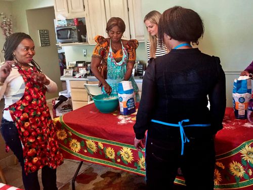 a group of women baking