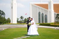 bride and groom on temple grounds