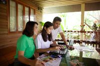 youth doing family history with parents