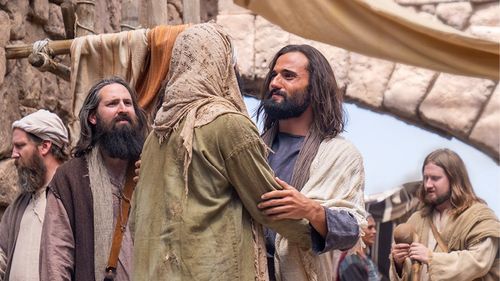 Jesus Christ greets blind man