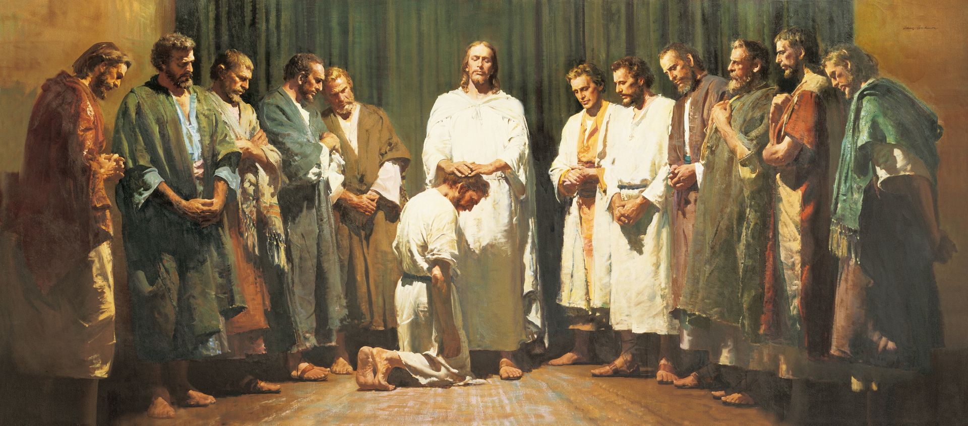 Christ with the twelve men chosen by Him to be His Apostles. Christ has His hands upon the head of one of the men (who kneels before Him) as He ordains the man to be an Apostle. The other eleven Apostles are standing to the left and right of Christ.