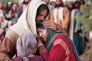 Bible video depiction of Jesus mourning with Mary and Martha