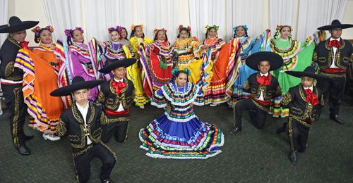 Mexican youth in traditional dance costumes