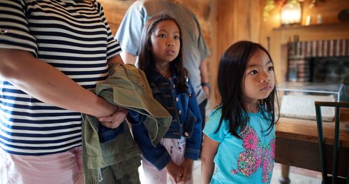 children inside Smith farmhouse