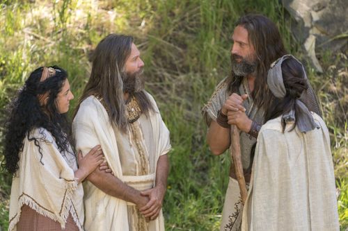 Nephi, Jacob, and their wives talking outside.