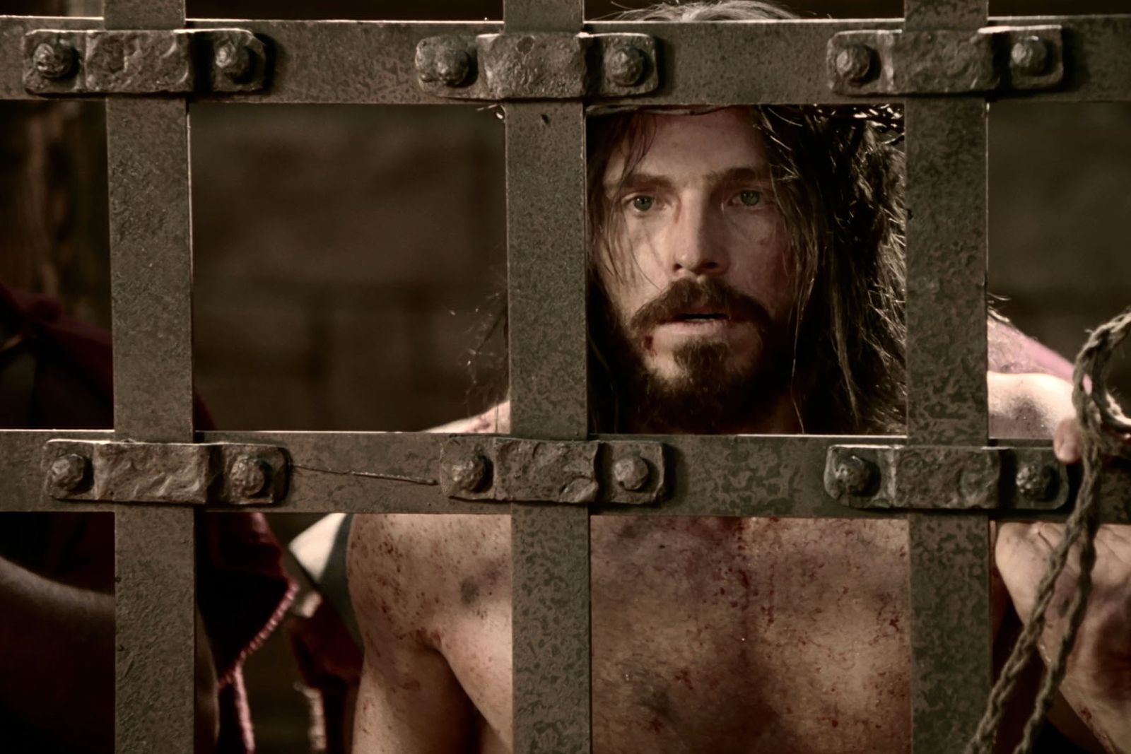 Jesus is scourged by soldiers while in prison.