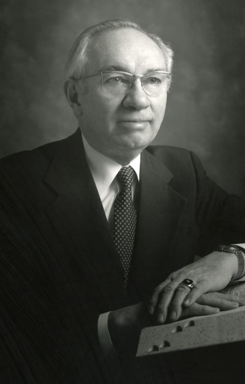 A black and white half-length portrait of President Gordon B. Hinckley.