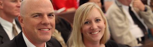 man and woman in Church meeting