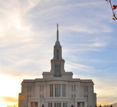 A view of the east side of the Payson Utah Temple during sunset.