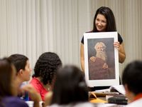 teacher with picture of Moses