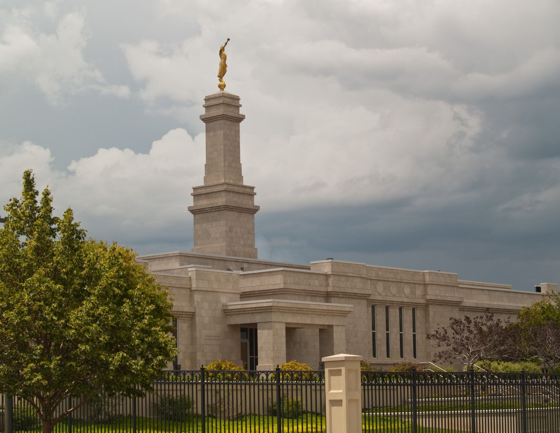 The Monticello Utah Temple spire, including the entrance and scenery.