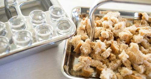 Sacrament trays with bread and water.