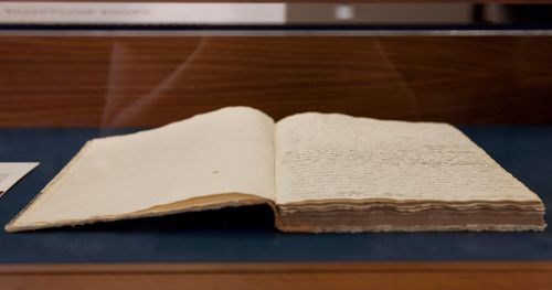 Original manuscript of the Book of Commandments in a display case.