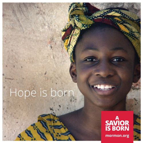 A close-up image a girl wearing a yellow head wrap, paired with the words “Hope is born.”