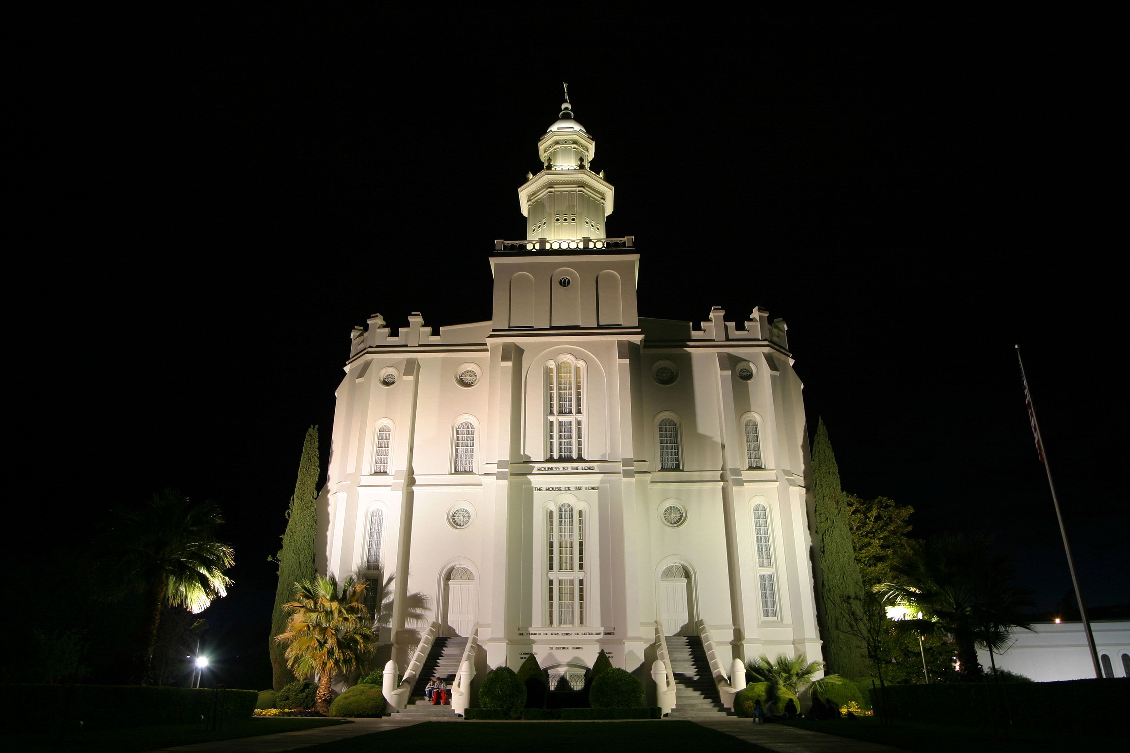 The St. George Utah Temple in the evening, including the entrance.