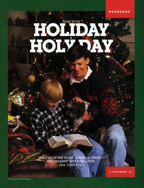 A photograph of two brothers sitting near a Christmas tree reading the scriptures, paired with the words “Make Your Holiday a Holy Day.”