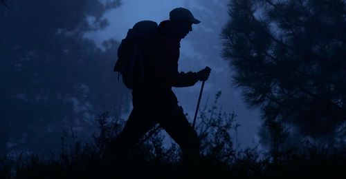 hiker in the dark