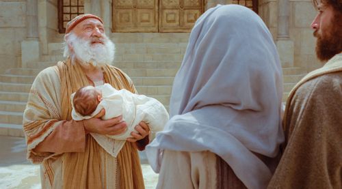 Luke 2:1–20, Christ as a baby is held by a priest at the temple.