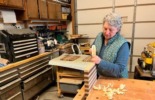 woman doing woodworking