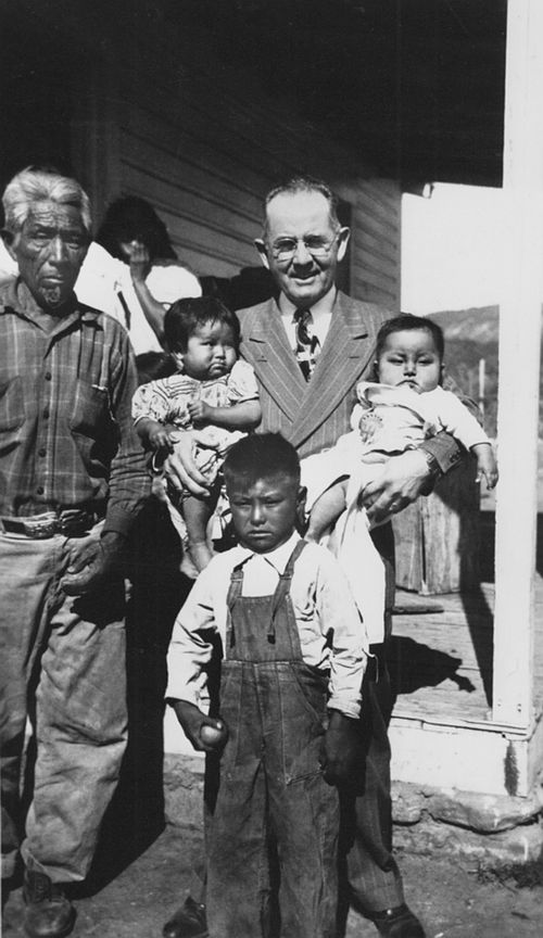 Kimball visiting American Indian family