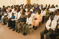 An African congregation gathered in sacrament meeting.