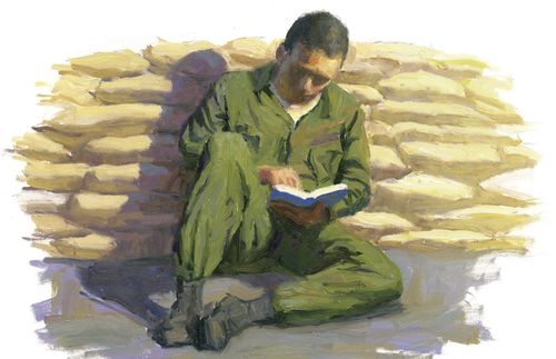 soldier reading scriptures