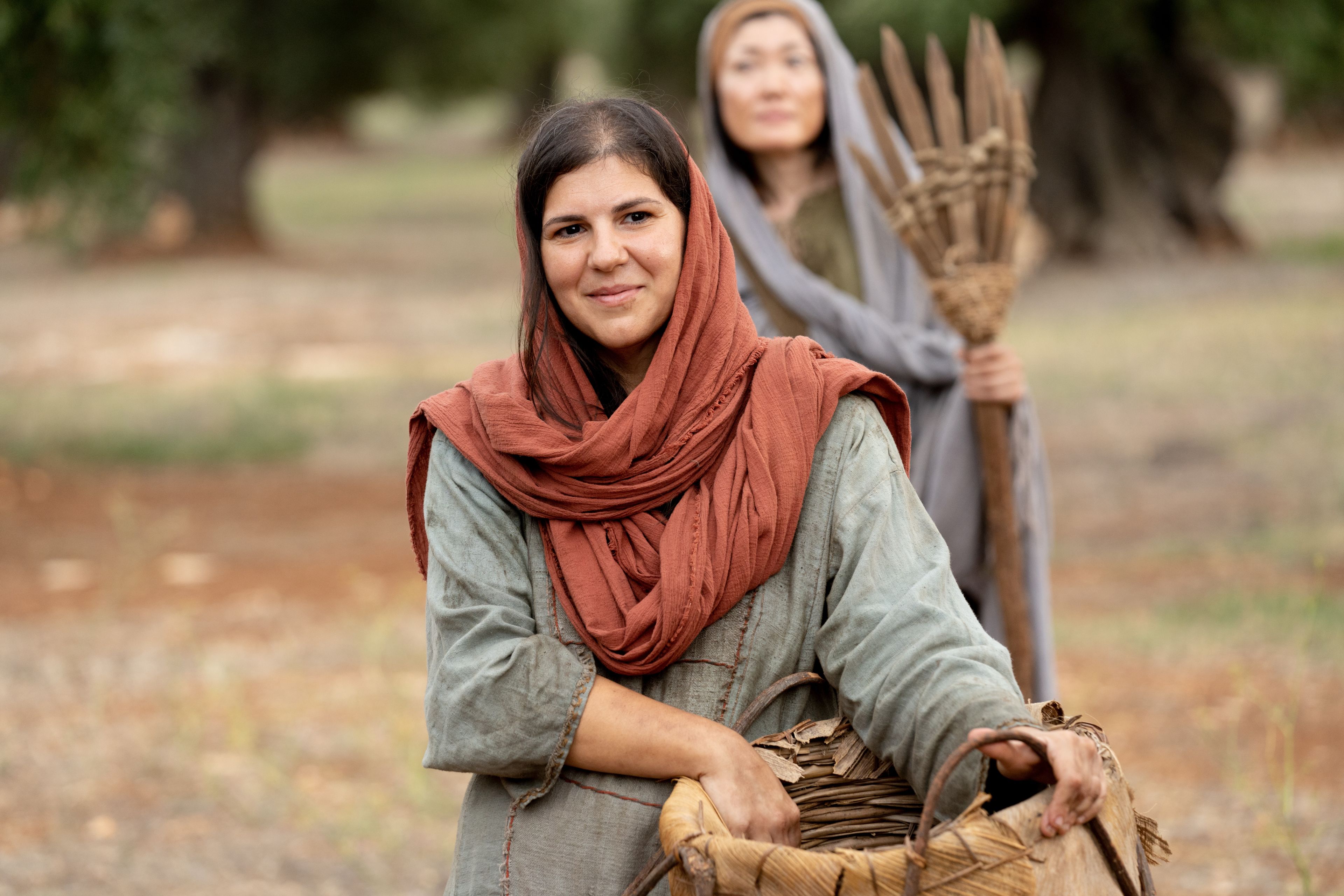 A Servant of the Vineyard listens to the Lord speak after her labor in the vineyard.