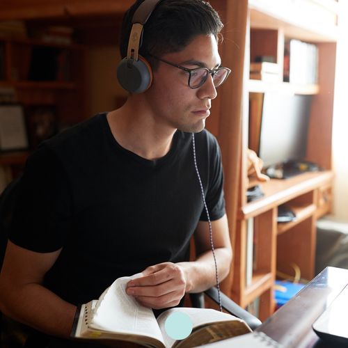 young man studying scriptures