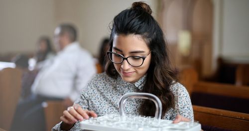 woman taking sacrament