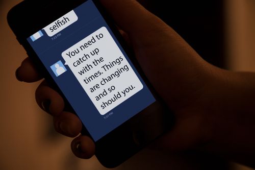 young woman using a mobile telephone