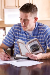 youth reading True to the Faith