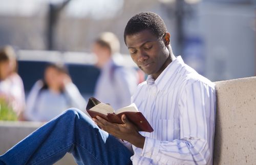 young man reading scriptures